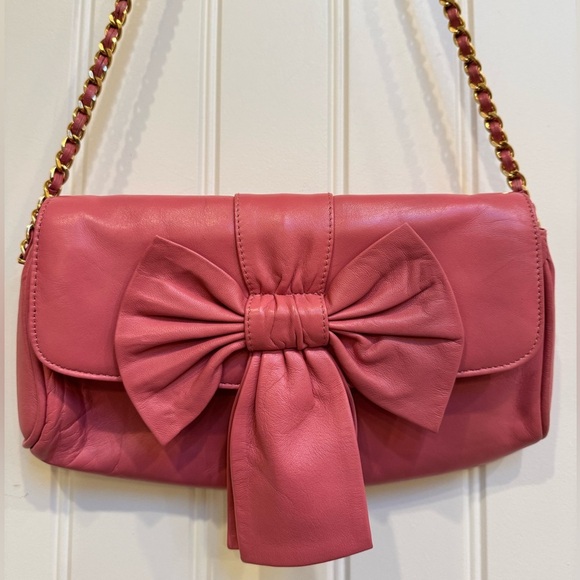 Paradox Pink Leather Bow Shoulder Purse. 10” by 6” by 0.5” with strap drop 13” - Picture 2 of 7
